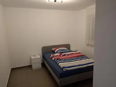 Ein Bett oder Betten in einem Zimmer der Unterkunft Exclusive new apartment