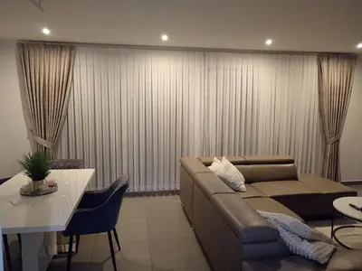 Ein Sitzbereich in der Unterkunft Exclusive new apartment