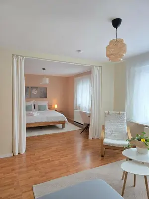 Ein Bett oder Betten in einem Zimmer der Unterkunft The Blue House