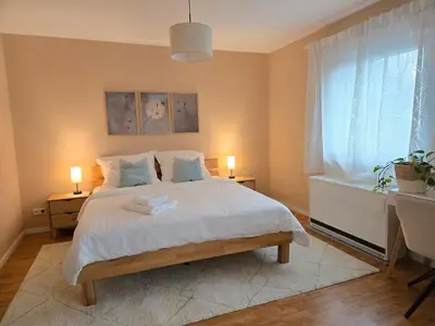 Ein Bett oder Betten in einem Zimmer der Unterkunft The Blue House