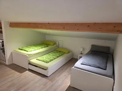Ein Bett oder Betten in einem Zimmer der Unterkunft StorchenNest Pfeifers OdenwaldNest