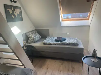 Ein Bett oder Betten in einem Zimmer der Unterkunft Freigeist Boho