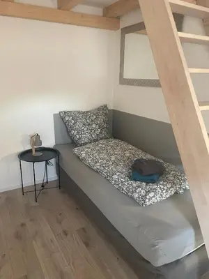 Ein Bett oder Betten in einem Zimmer der Unterkunft Freigeist Boho