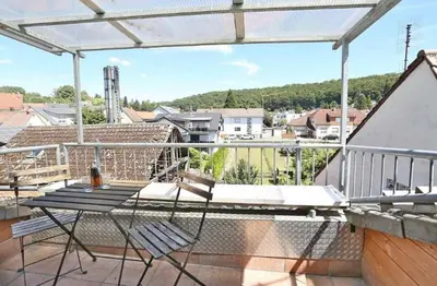 Ein Balkon oder eine Terrasse in der Unterkunft Charmante Wohnung mit Balkon im Herzen Hoffenheims