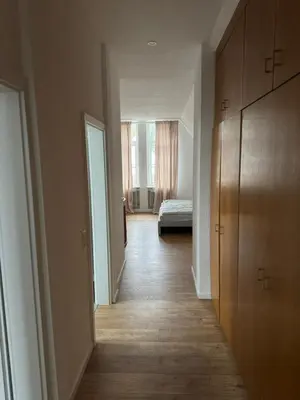 Ein Bett oder Betten in einem Zimmer der Unterkunft Zweistöckige Wohnung im weissen Lamm