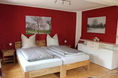 Ein Bett oder Betten in einem Zimmer der Unterkunft Ferienhaus Wingarda