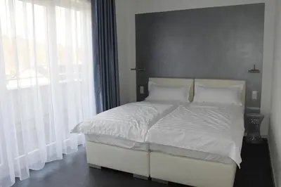 Ein Bett oder Betten in einem Zimmer der Unterkunft Victoria Living