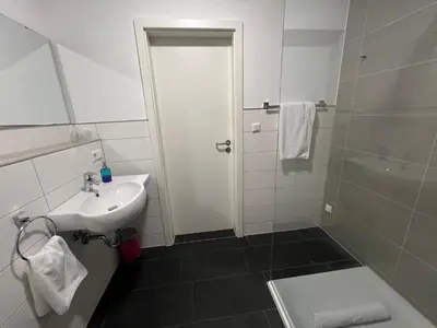 Ein Badezimmer in der Unterkunft Victoria Living