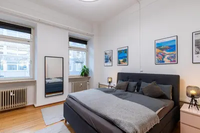 Ein Bett oder Betten in einem Zimmer der Unterkunft Modern apartment in a central location