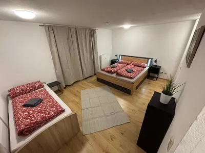 Ein Bett oder Betten in einem Zimmer der Unterkunft City Apart am MUSEUM nahe BADEWELT & Bahnhof