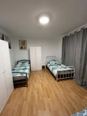 Ein Bett oder Betten in einem Zimmer der Unterkunft Rodgau Work & Sleep