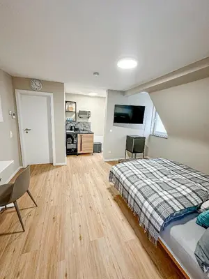 Ein Bett oder Betten in einem Zimmer der Unterkunft Pension Elisa