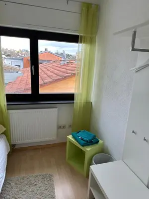 Ein Bett oder Betten in einem Zimmer der Unterkunft Lovingly and Calm Accommodation