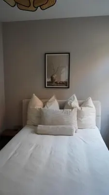 Ein Bett oder Betten in einem Zimmer der Unterkunft Deluxe Apartment Altstadt Luxus Klimaanlage