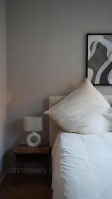Ein Bett oder Betten in einem Zimmer der Unterkunft Comfort Apartment Altstadt Wintergarten Klimaanlage