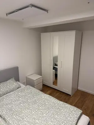 Ein Bett oder Betten in einem Zimmer der Unterkunft Große Wohneinheit Im Hotel weisses Lamm