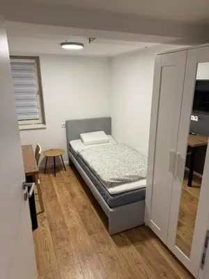 Ein Bett oder Betten in einem Zimmer der Unterkunft Große Wohneinheit Im Hotel weisses Lamm