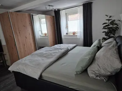 Ein Bett oder Betten in einem Zimmer der Unterkunft Rebenhaus St Martin