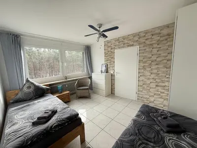Ein Bett oder Betten in einem Zimmer der Unterkunft Apartment auf dem Betzenberg