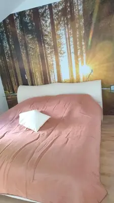 Ein Bett oder Betten in einem Zimmer der Unterkunft Kleine Pfalz im Casa del Cornelia