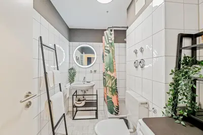 Ein Badezimmer in der Unterkunft Goldstadt Fancy Apartment