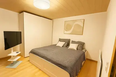 Ein Bett oder Betten in einem Zimmer der Unterkunft Gemütliches Wohnen in St Leon Rot