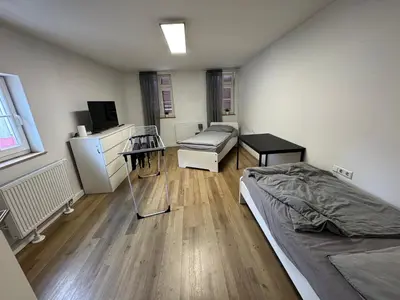 Ein Bett oder Betten in einem Zimmer der Unterkunft Monteurszimmer Renix Heilbronn
