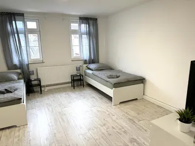Ein Bett oder Betten in einem Zimmer der Unterkunft Monteurszimmer Renix Heilbronn