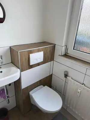 Ein Badezimmer in der Unterkunft Ferienwohnung warm & Komfortabel, Ruhige Lage zentral gelegen