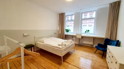 Ein Bett oder Betten in einem Zimmer der Unterkunft Zimmer im Erdgeschoss