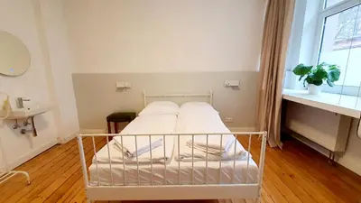 Ein Bett oder Betten in einem Zimmer der Unterkunft Zimmer im Erdgeschoss
