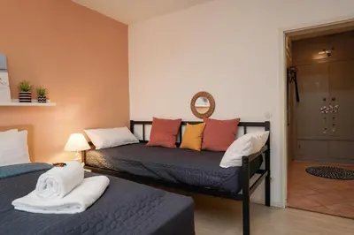 Ein Bett oder Betten in einem Zimmer der Unterkunft Gemütliche 2-Zi-Whg mit Balkon im Süden von HD