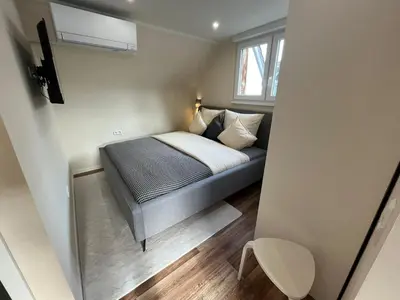 Ein Bett oder Betten in einem Zimmer der Unterkunft Lumio Apartment 2