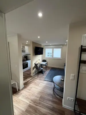 Ein Sitzbereich in der Unterkunft Lumio Apartment 2