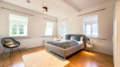Ein Bett oder Betten in einem Zimmer der Unterkunft LudwigsHome Apartmenthaus - Einzelapartments mit kostenfreiem Parkplatz, WLAN, voll ausgestatteter Küche