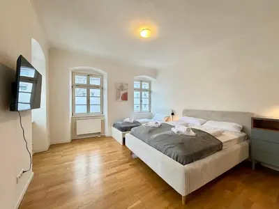 Ein Bett oder Betten in einem Zimmer der Unterkunft LudwigsHome Apartmenthaus - Einzelapartments mit kostenfreiem Parkplatz, WLAN, voll ausgestatteter Küche