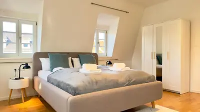 Ein Bett oder Betten in einem Zimmer der Unterkunft LudwigsHome Apartmenthaus - Einzelapartments mit kostenfreiem Parkplatz, WLAN, voll ausgestatteter Küche