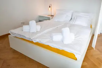 Ein Bett oder Betten in einem Zimmer der Unterkunft DowntownApartment Ludwigsburg