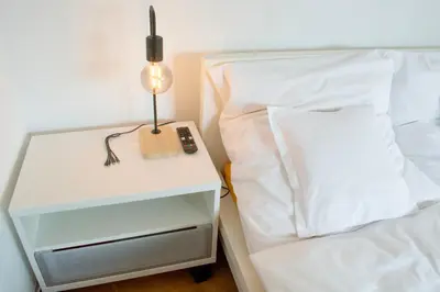 Ein Bett oder Betten in einem Zimmer der Unterkunft DowntownApartment Ludwigsburg