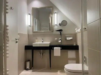 Ein Badezimmer in der Unterkunft Villa Waldfrieden - Design trifft Budget