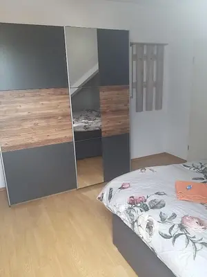Ein Bett oder Betten in einem Zimmer der Unterkunft Ueber den Dächern von Alzey