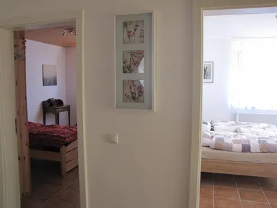 Ein Bett oder Betten in einem Zimmer der Unterkunft Feriendomizil Weinheim