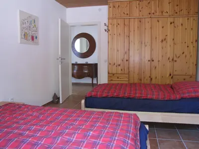 Ein Bett oder Betten in einem Zimmer der Unterkunft Feriendomizil Weinheim