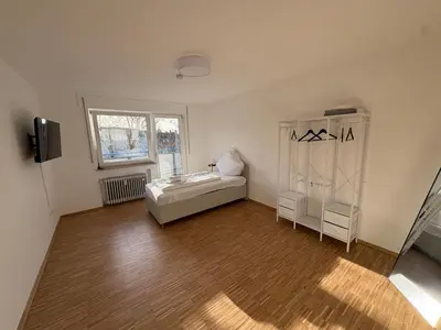 Ein Bett oder Betten in einem Zimmer der Unterkunft Altstadtperle Ettlingen mit Smart TV und WLAN