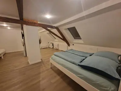 Ein Bett oder Betten in einem Zimmer der Unterkunft Janna's City Appartement
