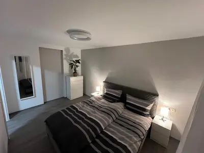 Ein Bett oder Betten in einem Zimmer der Unterkunft Ferienwohnung zum Kriegerdenkmal