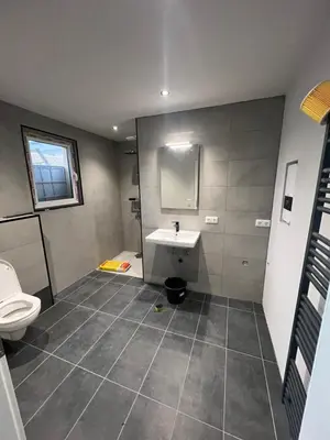 Ein Badezimmer in der Unterkunft Ferienwohnung zum Kriegerdenkmal