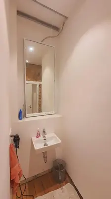 Ein Badezimmer in der Unterkunft Zimmer im Erdgeschoss