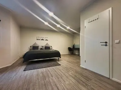 Ein Bett oder Betten in einem Zimmer der Unterkunft HAVENU Hotel Quartier 8