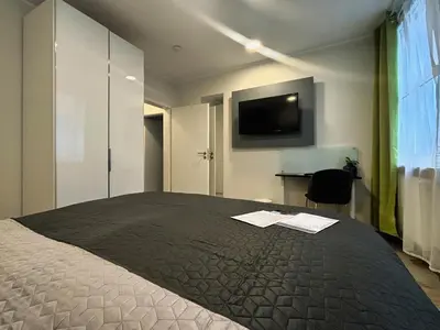 Ein Bett oder Betten in einem Zimmer der Unterkunft HAVENU Hotel Quartier 8